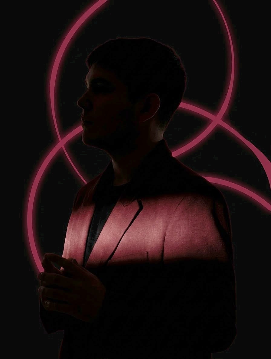 Askari Sbeity in a burgundy jacket